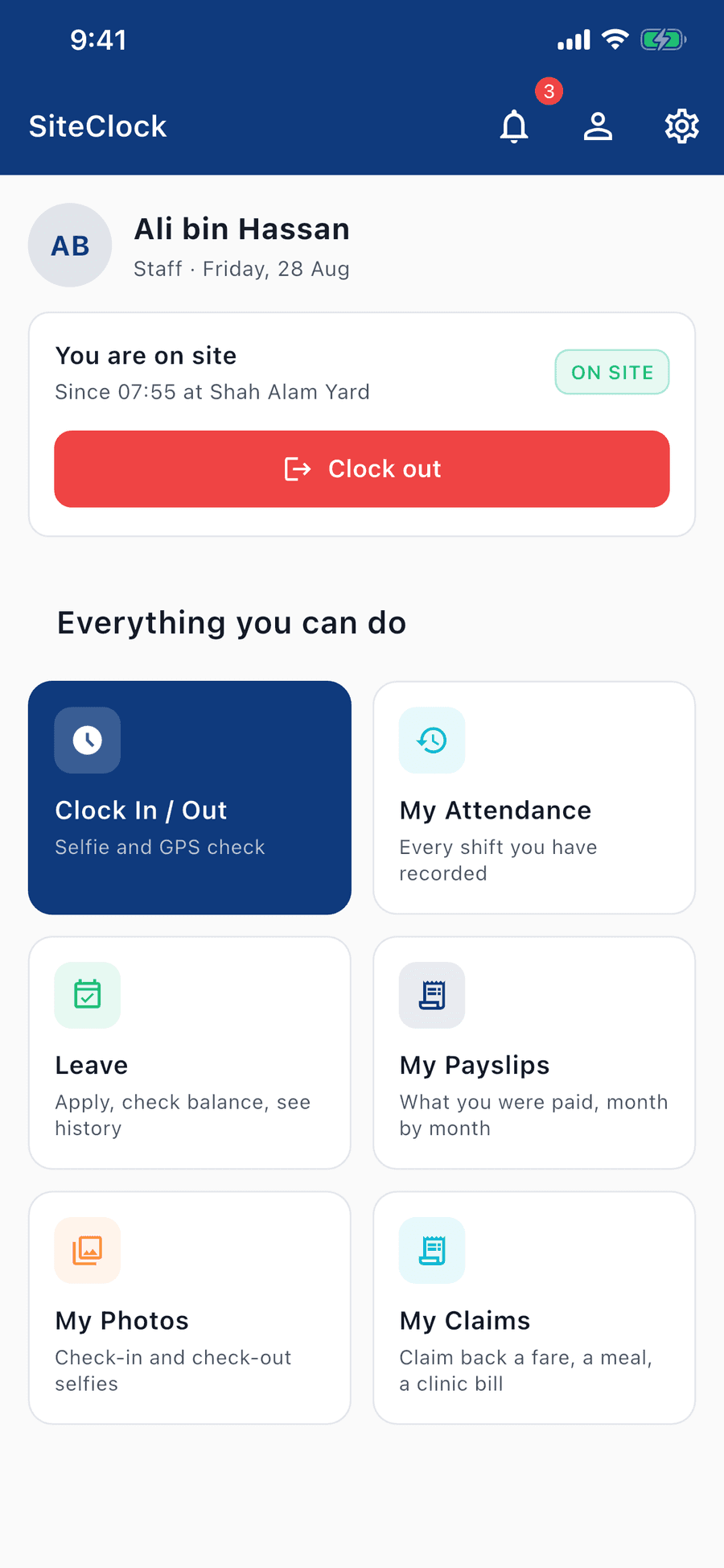 A worker's home screen on Friday 28 August. A status card reads "You are on site — since 07:55 at Shah Alam Yard", badged ON SITE, above a red Clock out button. Beneath it an "Everything you can do" grid of six tiles: Clock In / Out with a selfie and GPS check, My Attendance, Leave, My Payslips, My Photos, and My Claims.