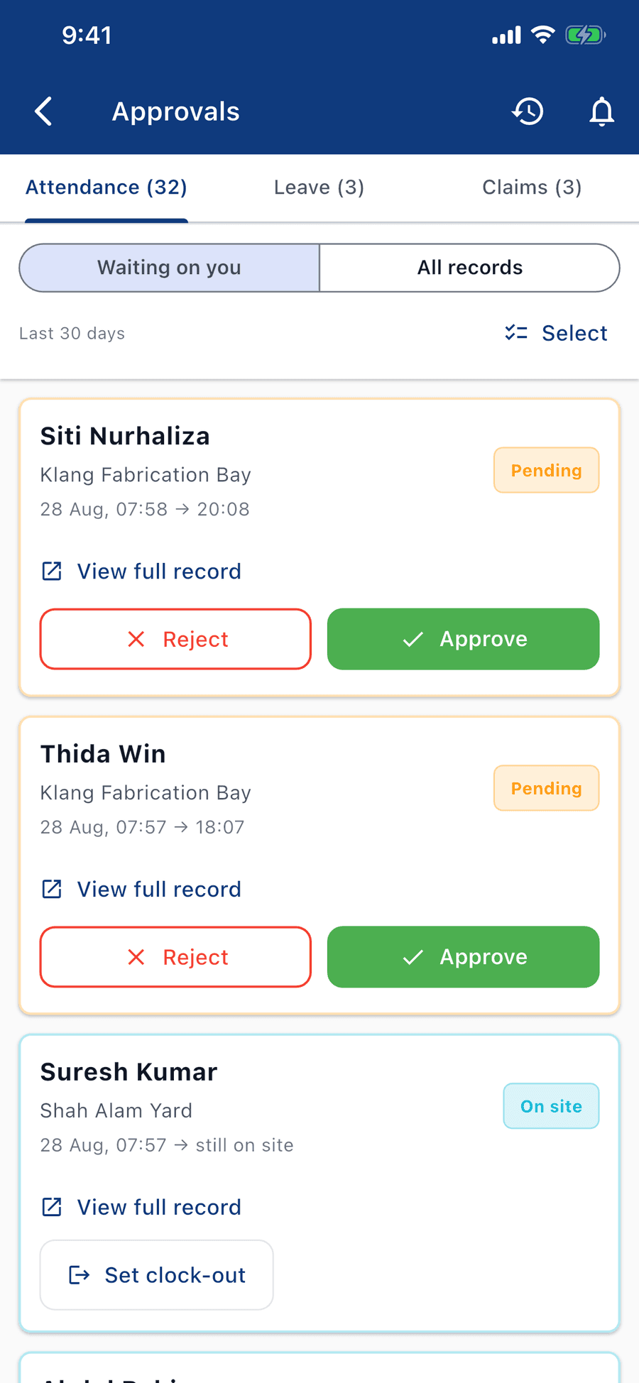The Approvals queue on its Attendance tab, holding 32 items against 3 for Leave and 3 for Claims, filtered to "Waiting on you" over the last 30 days. Two pending shifts at Klang Fabrication Bay on 28 Aug show their in and out times with View full record, Reject and Approve beneath each. A third card is badged On site — clocked in at 07:57 and still working — so it offers Set clock-out instead of an approval.
